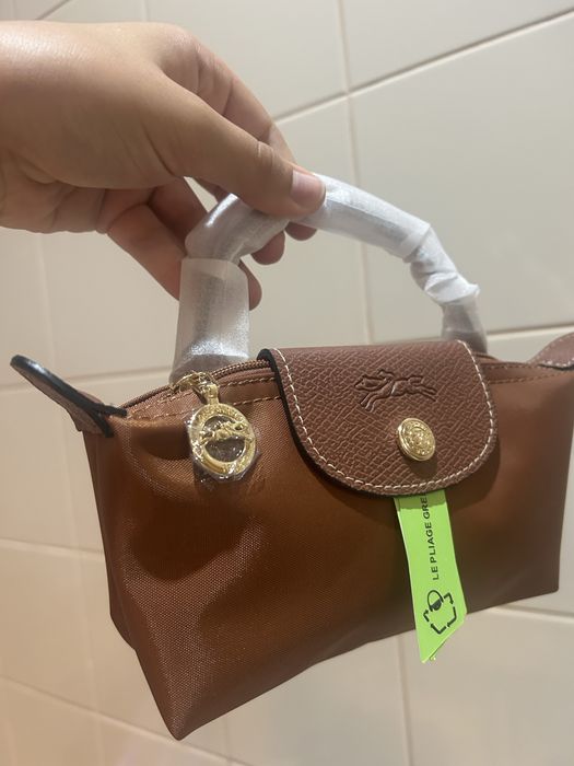 Mala longchamp castanha