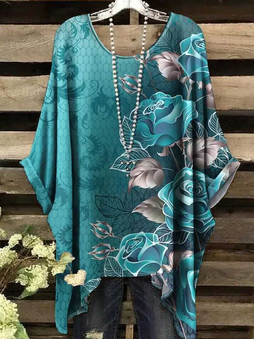 Elegancka turkusowa bluzka z rękawem do łokcia r. 54/56