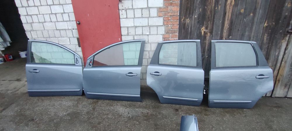 Nissan Note E11 drzwi lewe prawe przód lub tył B52G