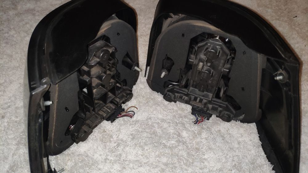 Faróis Hella black VW Golf iv