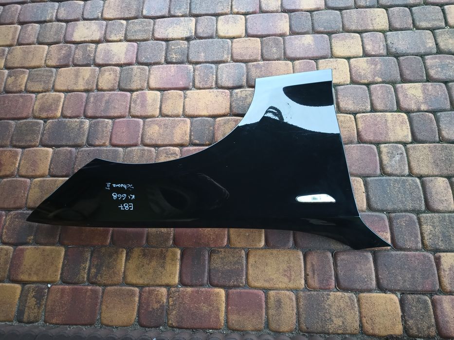 BMW e87 e81 blotnik prawy przód kolor 668 schwarz 2