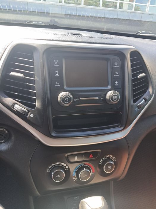 Магнитола+рамка джип чироки