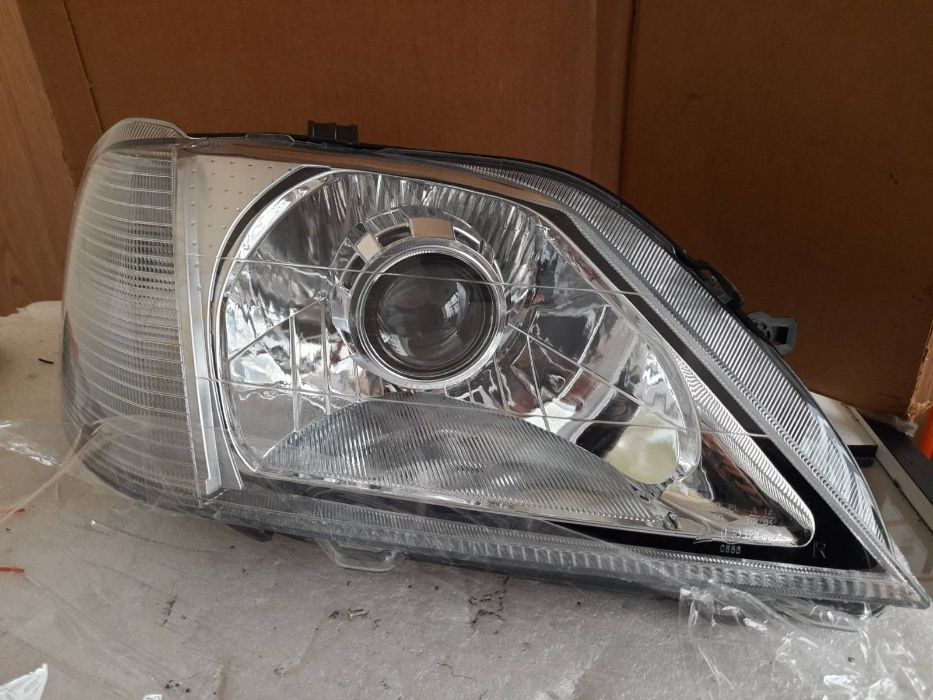 Новые фары с линзами Renault/Dacia Logan (Рено логан)