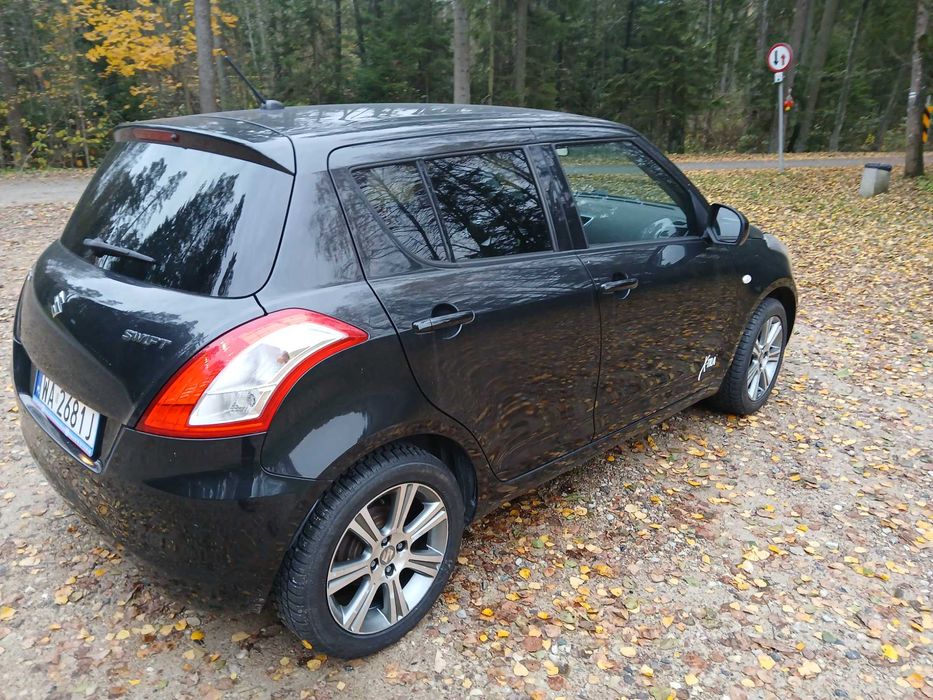 Suzuki Swift  X -TRA