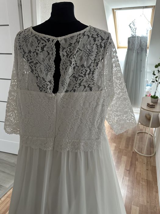 Suknia ślubna 54-60