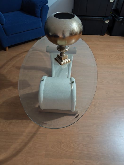 Mesa com tampo vidro e base pedra e madeira