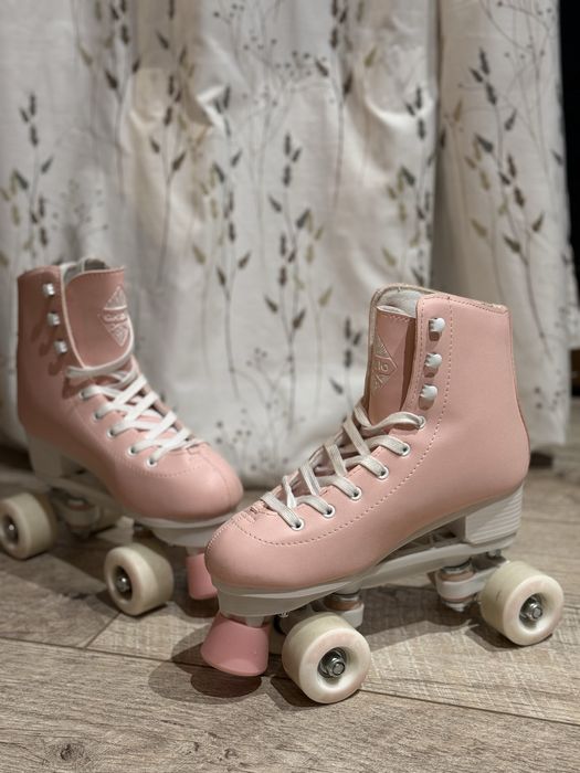 Продам Роликові ковзани б/у Oxelo 8503716 рожеві 38р.