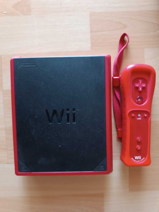 Wii com pouco uso + comando + 3 jogos