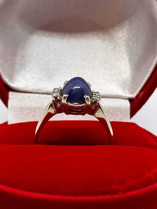 Złoty pierścionek z szafirem gwiaździstym i bryl. 4,02g r.18 p500/ CH