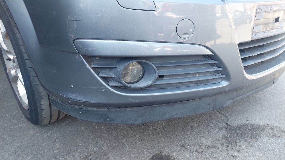 Pára-choques frente OPEL Astra H Caravan (L35)