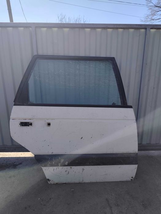 Двері наружні пассат б3 універсал, стікла задні, вакуум