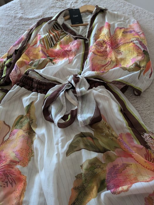 Fato CAWÉ com etiqueta