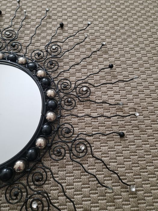 Espelho em formato Sol64551526407553122