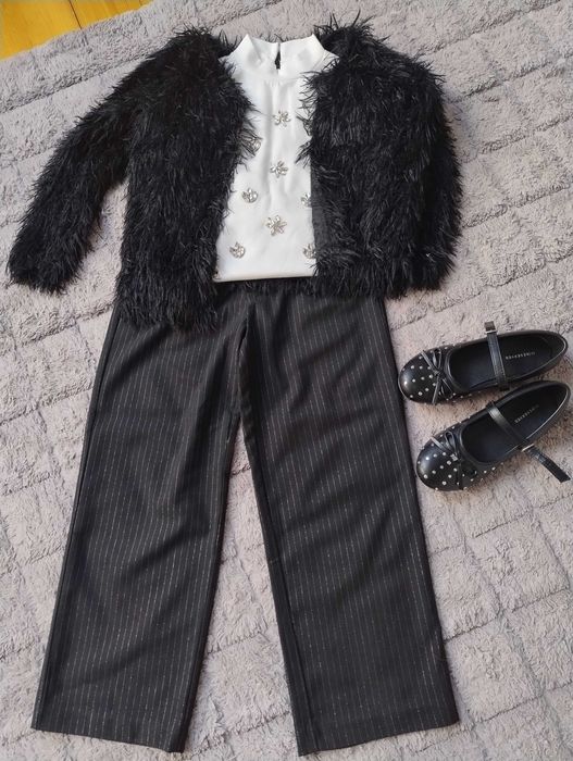 Śliczny sweterek firmy Reserved r. 134