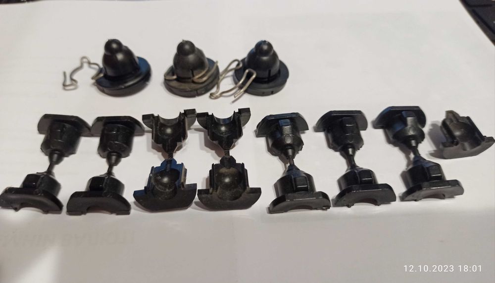 Кліпси, кріплення для  фар  Ford Escort MK-4