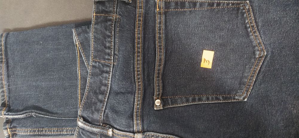 Granatowe jeansy H&M