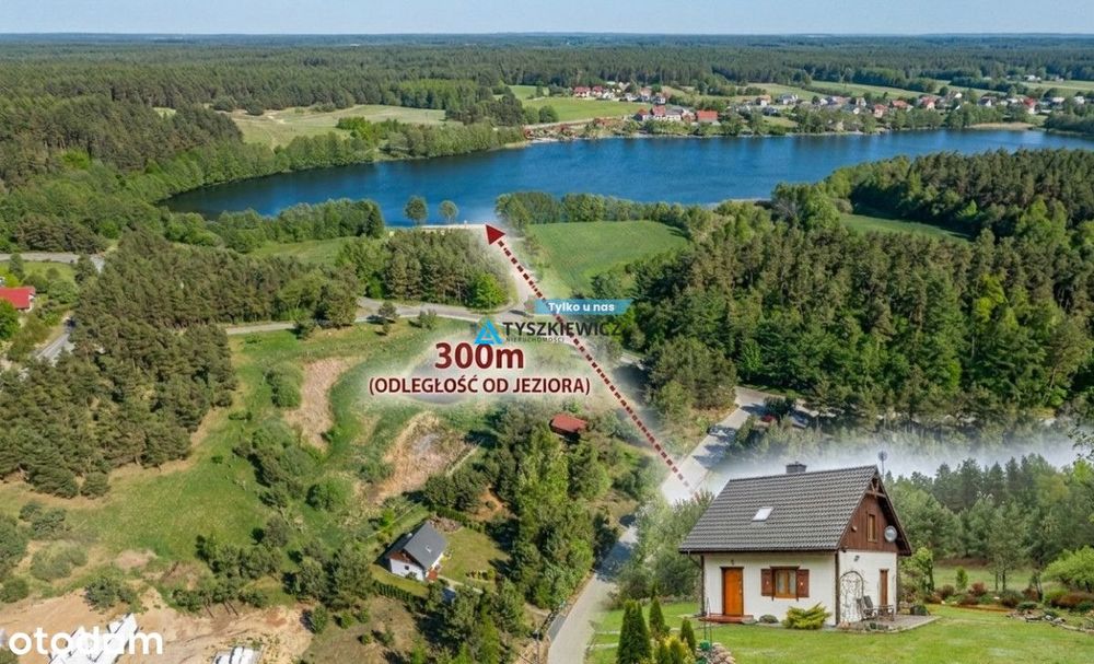 Urokliwy dom, otoczony drzewami, nad J.Kamieniczno