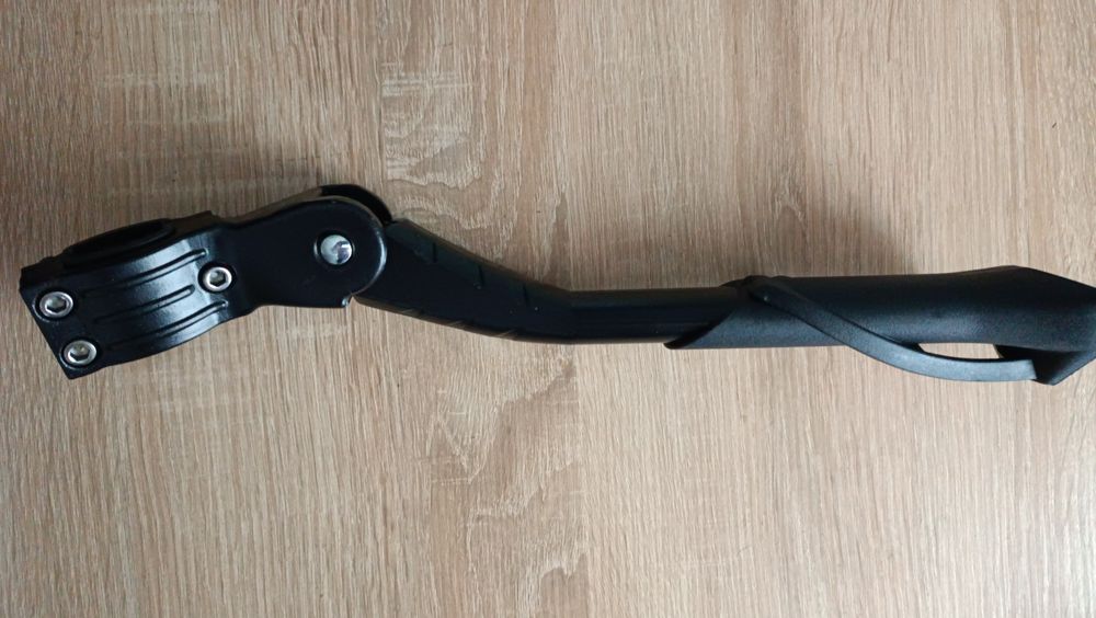 Підніжка регульована на перо велосипеда