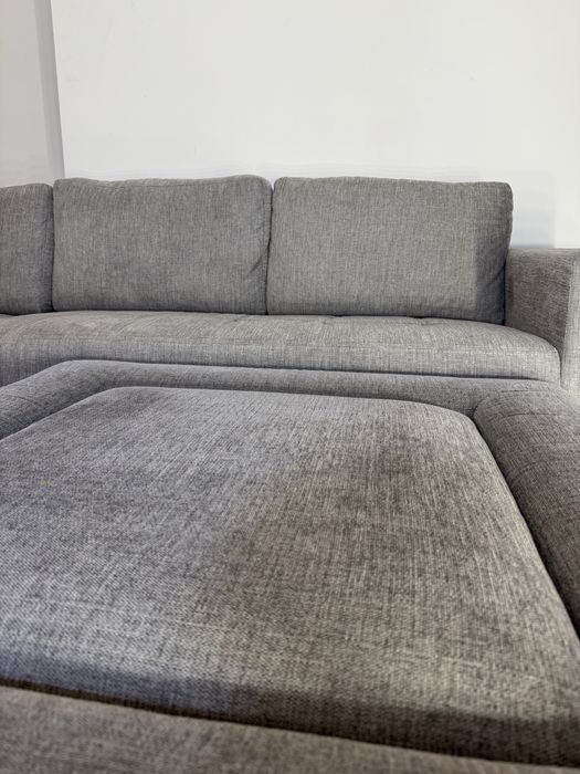 Szary duży narożnik z dostawianą pufą
