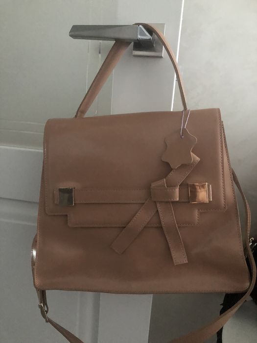 Шкіряна сумка…………