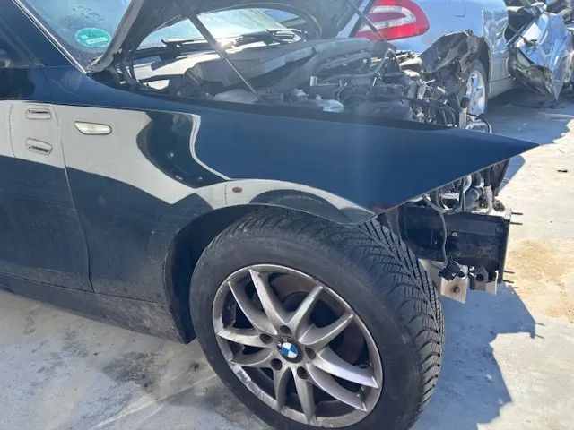 BŁOTNIK PRAWY PRZÓD BMW E87 668
