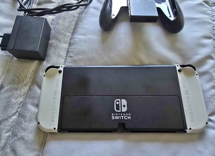 fantástico kit Nintendo Switch OLED, que está em excelente estado de conservação, conforme pode verificar pelas imagens reais