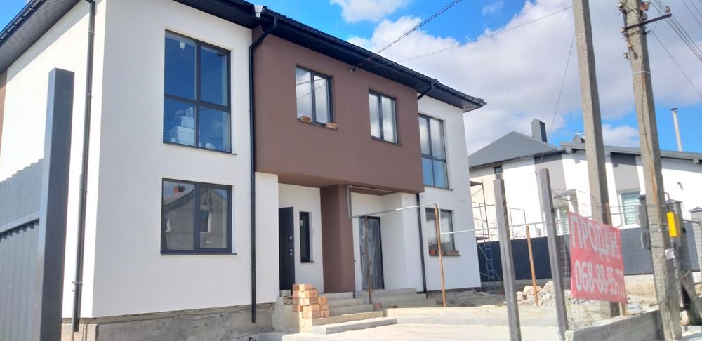 Фасадні роботи утеплення будинку пінопласт мінвата панелі для фасаду