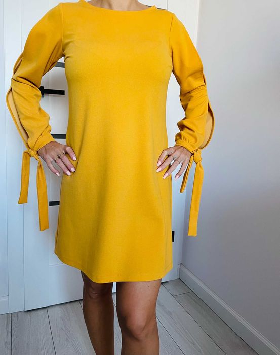Żółta trapezowa sukienka z ozdobnymi rękawami rozmiar M