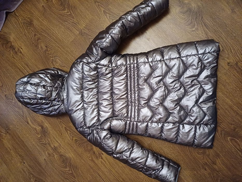 Курточку на зиму дівчинку 8років