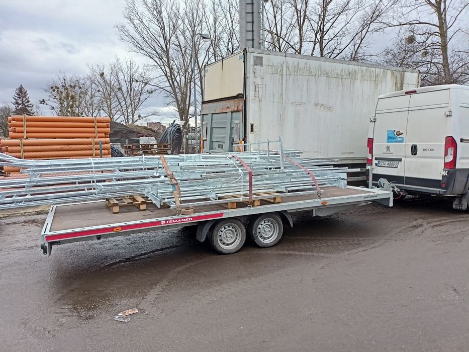 Transport usługi tran przewóz towarów rzeczy laweta platforma  dłużyca