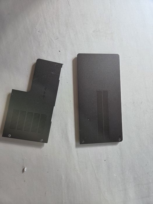Sprzedam 2 zaślepki dolnej obudowy do laptopa hp compa presario CQ56