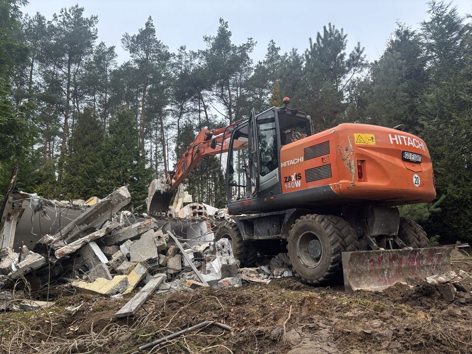 Prace ziemne Wyburzenia rozbiórki budynkow garazów wywóz gruzu ziemi
