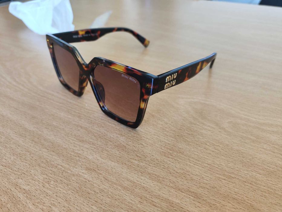 Oculos de Sol MIU MIU