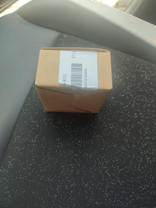 Botão porta bagagens