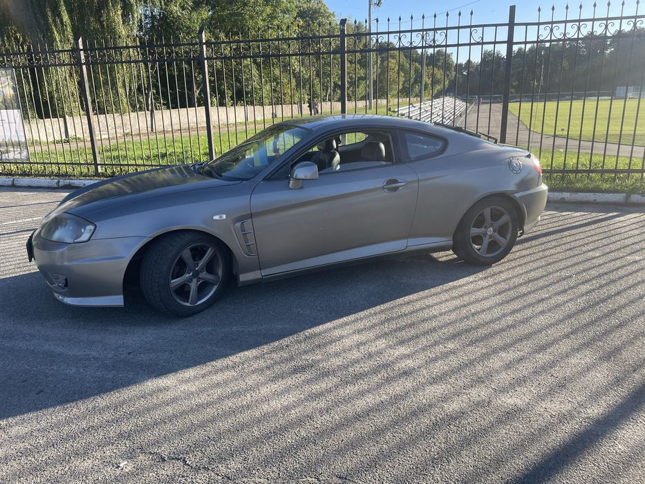Hyundai Coupe 2006 VIN KMHHN61FP6U213796 фото оголошення 11 з 19