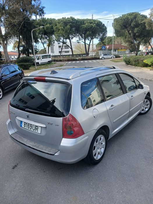 Peugeot 307 de 7 lugares 2004 gasolina super económico ac carregado