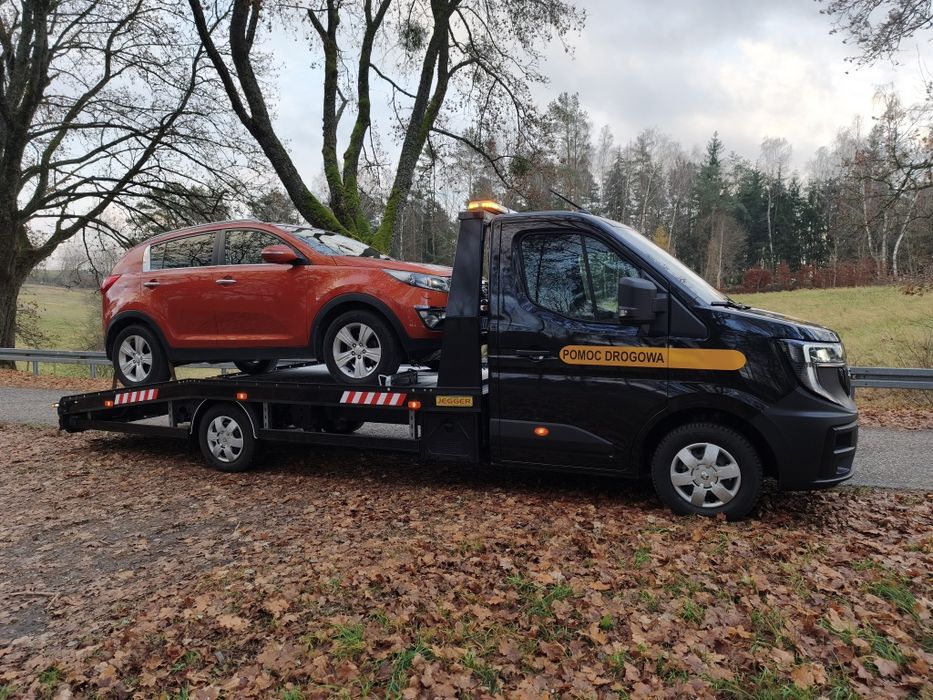 Autolaweta*Przewóz samochodów,osób,sprzętu rolniczego i inne.