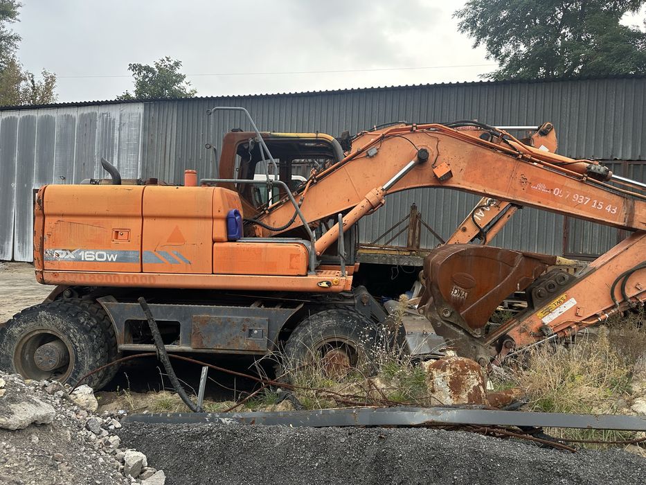 Продам екскаватор дуасан цілий або по запчастинам