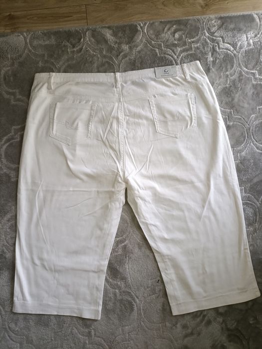 Białe spodnie bawełna 42 jeansy głęboki stan