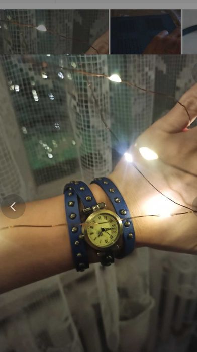 Zegarek na długim owijanym pasku,