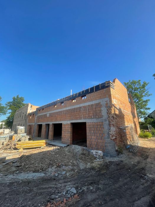 Budowy Przebudowy budynków kamienic hal magazynów remonty domów biur