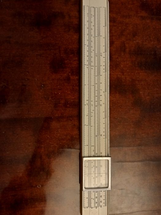 Антикварная логарифмическая линейка