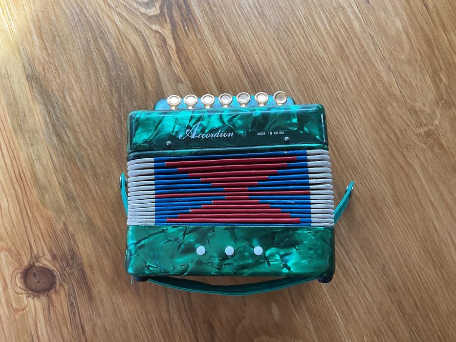 Mini acordion portátil