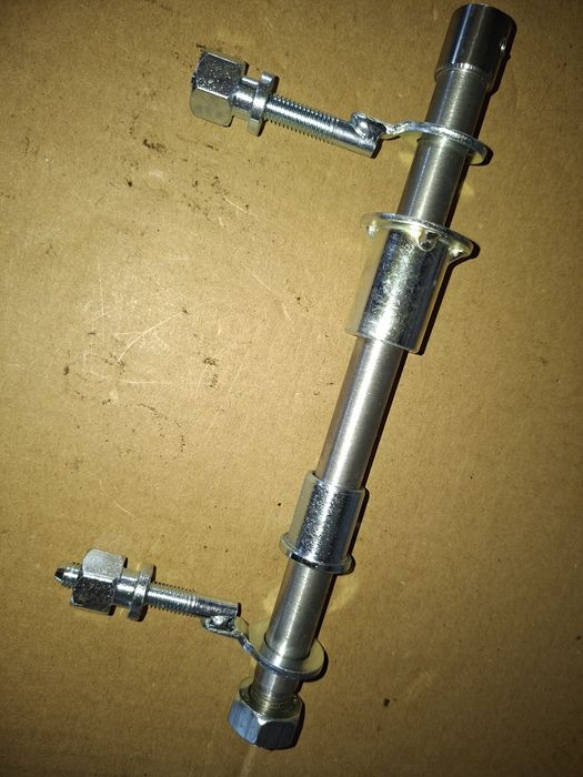 Nowa kpl oś kola tyl wsk 125 b3 tulejki napinacze kpl pl