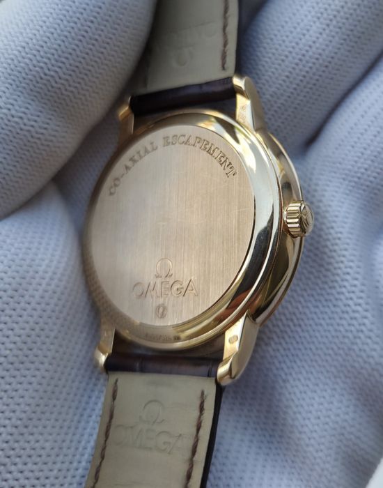 Швейцарскій годинник Omega De Ville