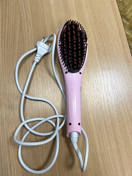 Електрична розчіска виправляч