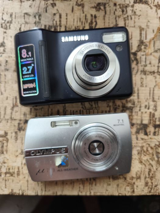 Olimpus m700. Samsung  S830