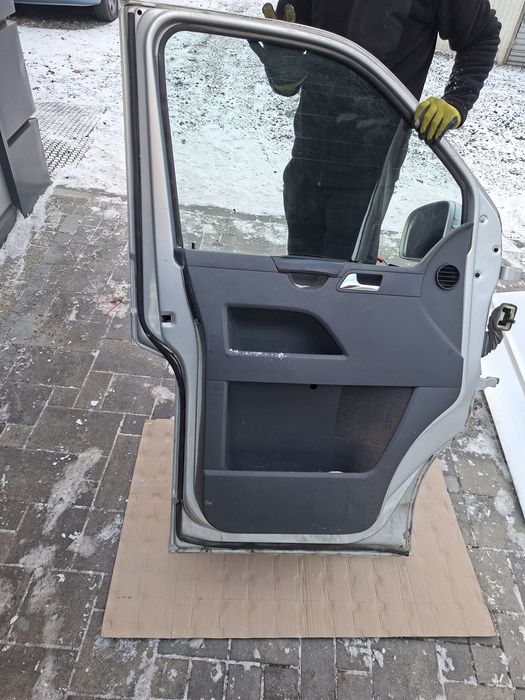 Vw transporter t5 drzwi przednie lewe lewy przod srebrne la7w
