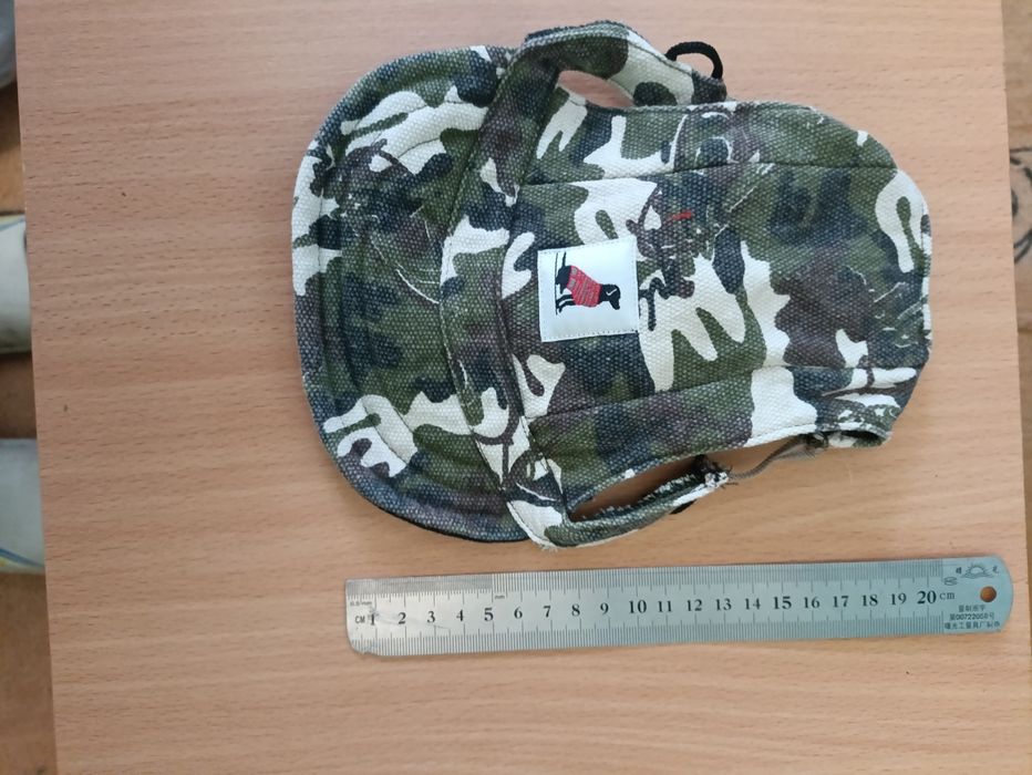 Захисні шапочки для собак.