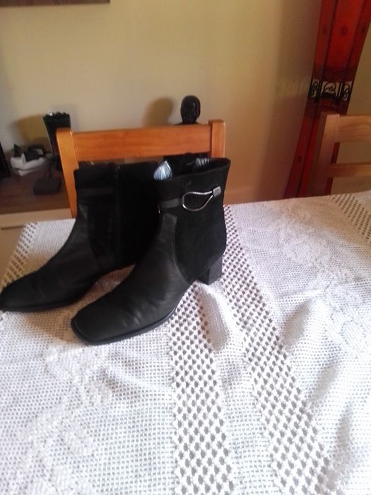 Botas cm pouco uso